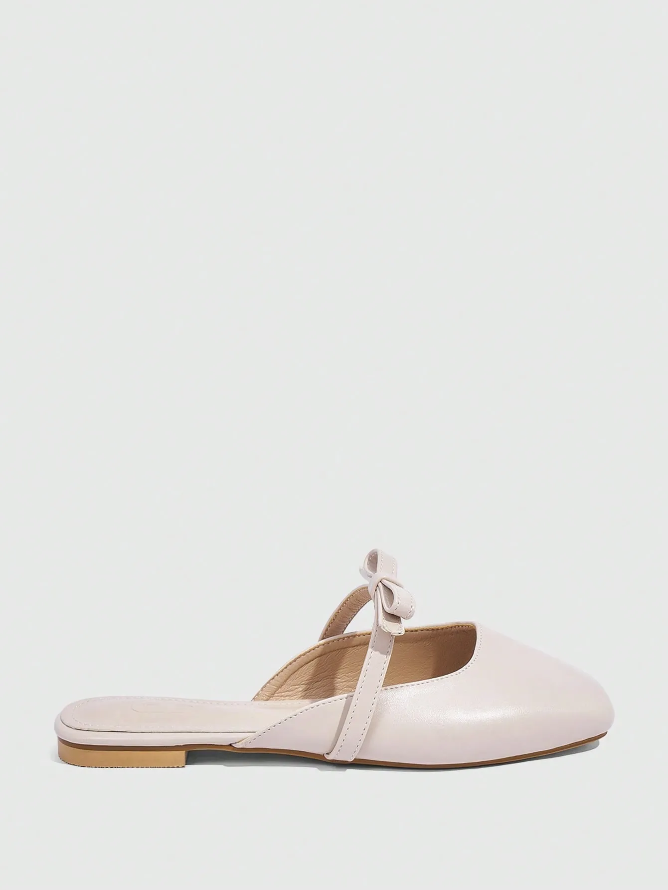 CUCCOO CURVES CUCCOO Apricot Colored Square-Toe Flat Mules With Bowknot Decoration