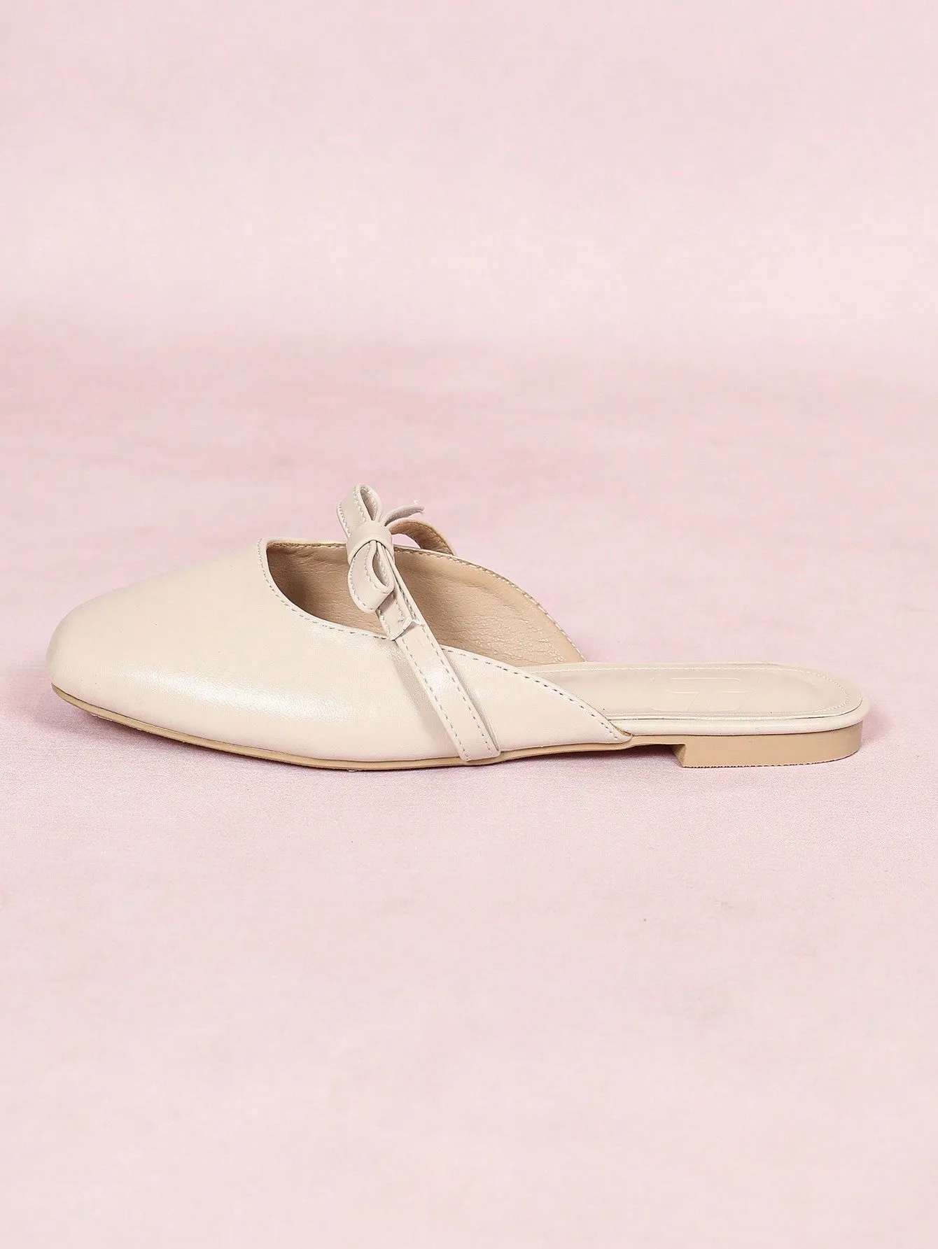 CUCCOO CURVES CUCCOO Apricot Colored Square-Toe Flat Mules With Bowknot Decoration