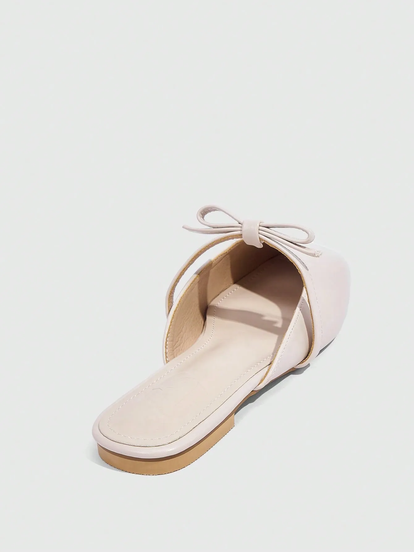 CUCCOO CURVES CUCCOO Apricot Colored Square-Toe Flat Mules With Bowknot Decoration